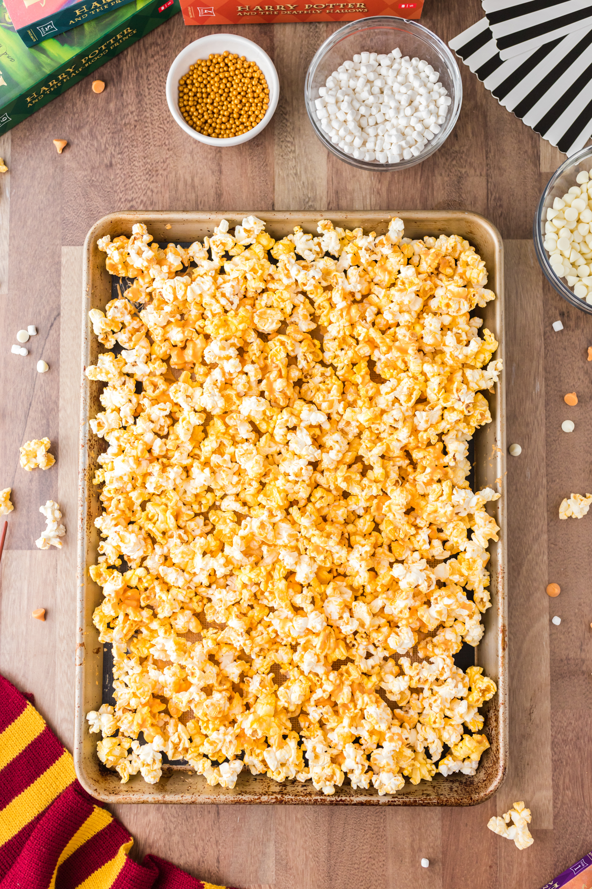 buttered popcorn on a cookie sheet
