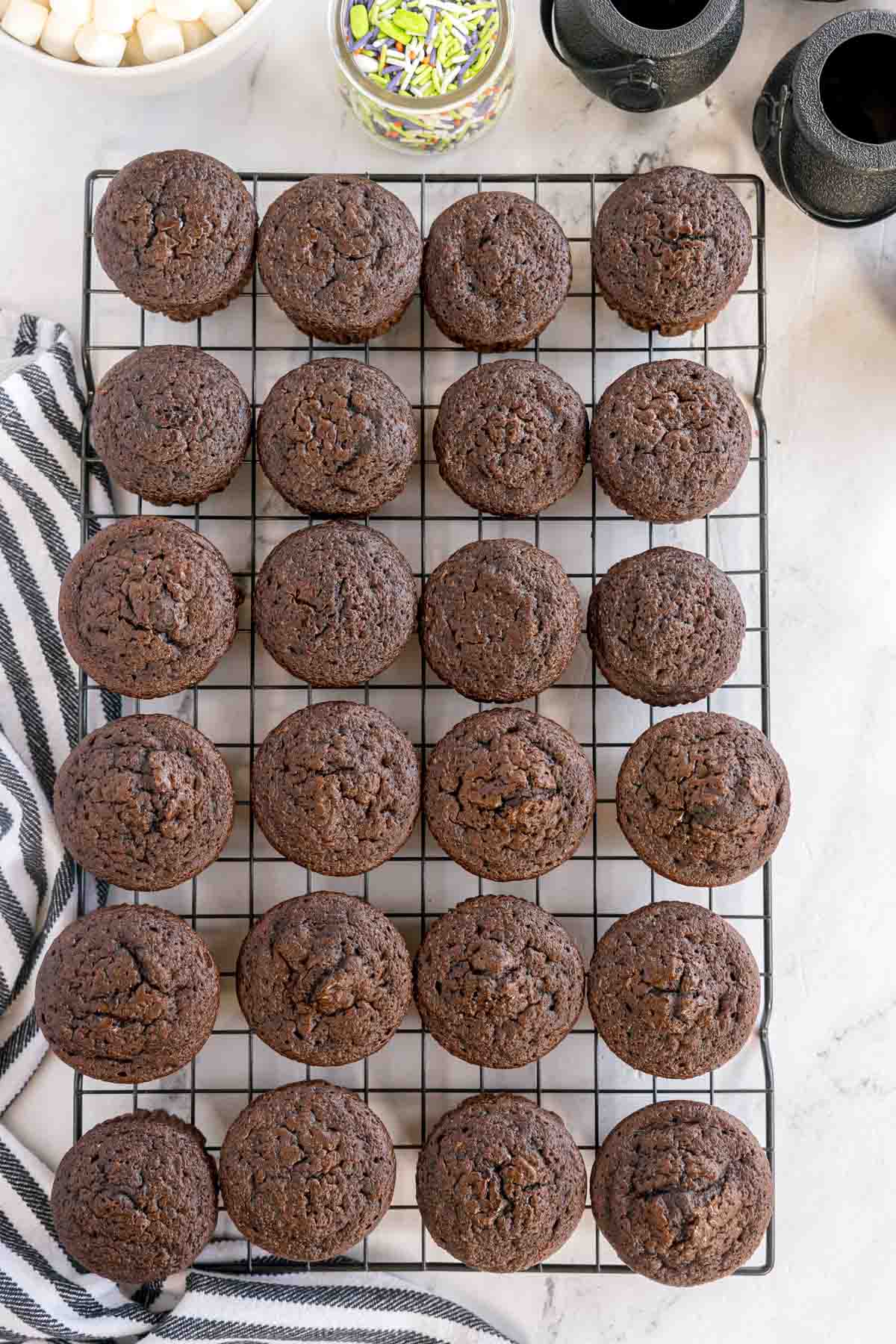 devil's food cupcakes on a cooling rack