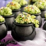 cauldron cupcakes on a spiderweb tablecloth