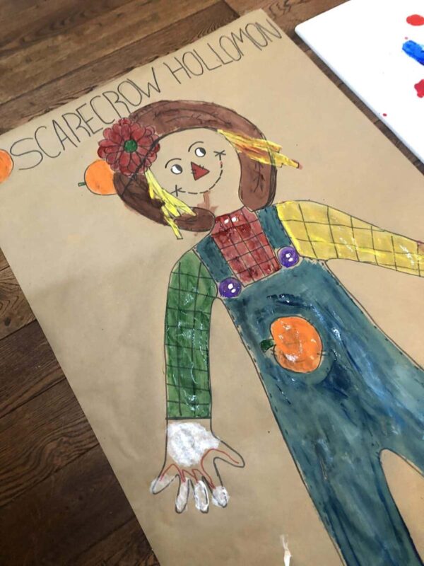 children's scarecrow painting with colorful clothing