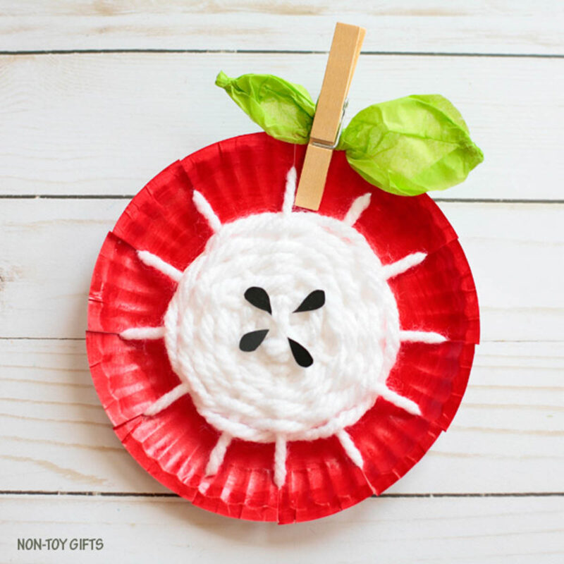 paper plate with yarn to look like an apple