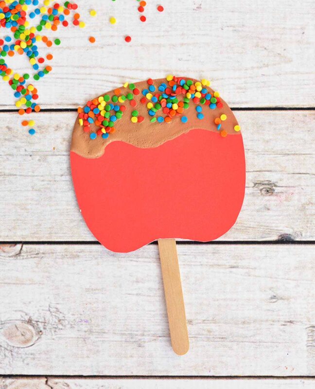 caramel apple craft with colorful sprinkles on top