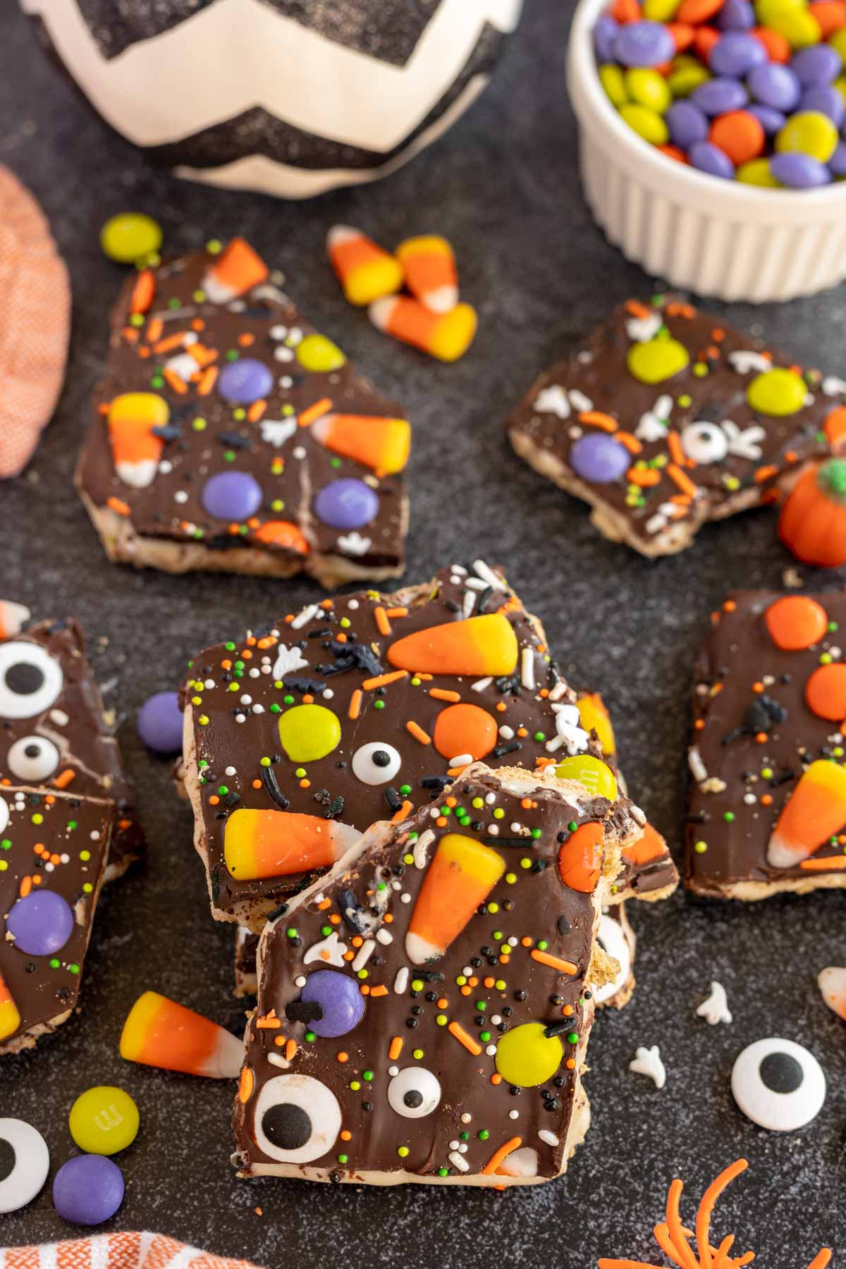 pieces of Halloween bark on a black backdrop