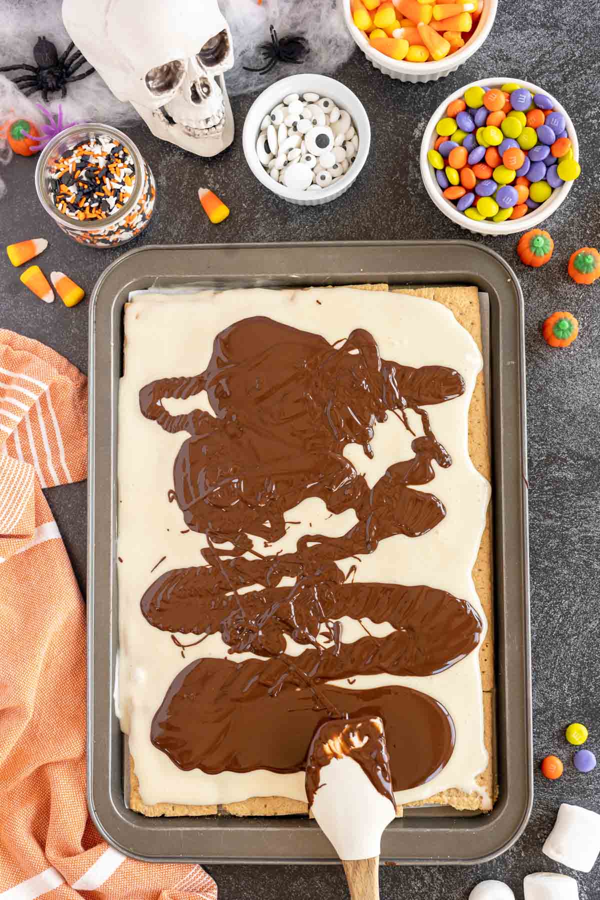 melted chocolate on top of Halloween bark