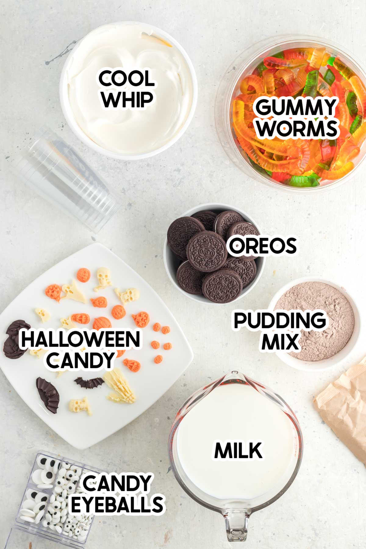 ingredients to make Halloween dirt cups with labels
