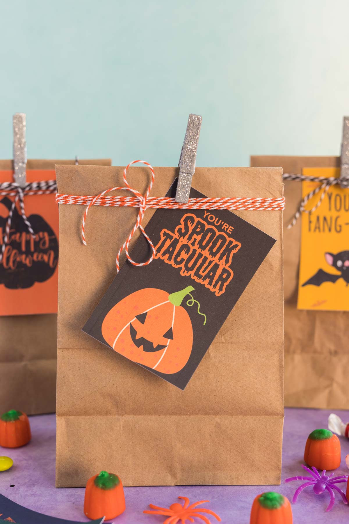 brown paper bag with Halloween gift tags