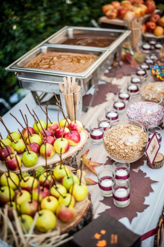 food table with candy apple supplies
