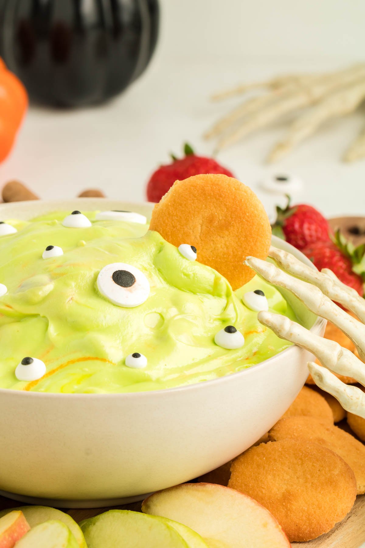 Bowl of green colored marshmallow dip