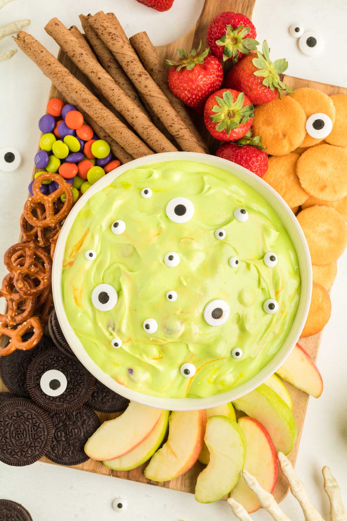 green marshmallow dip on a fruit tray