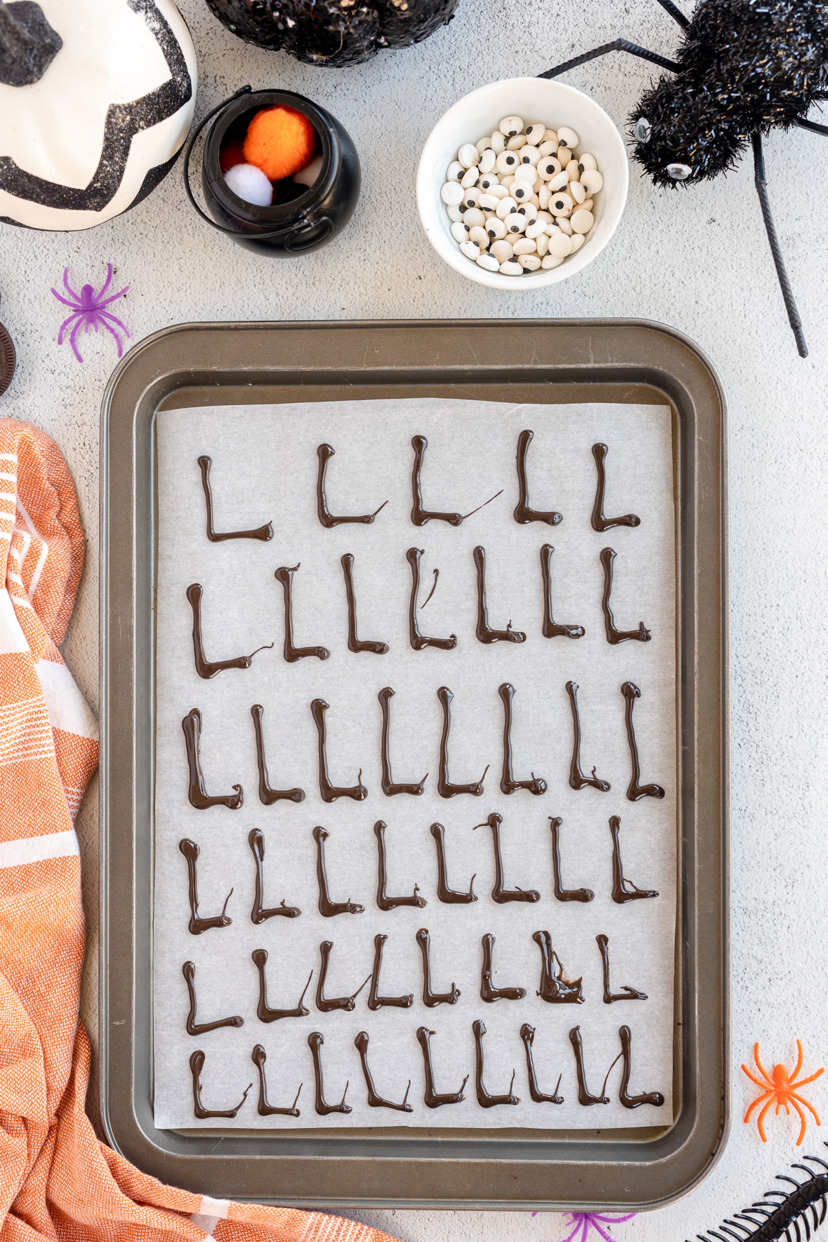 baking sheet with chocolate spider legs