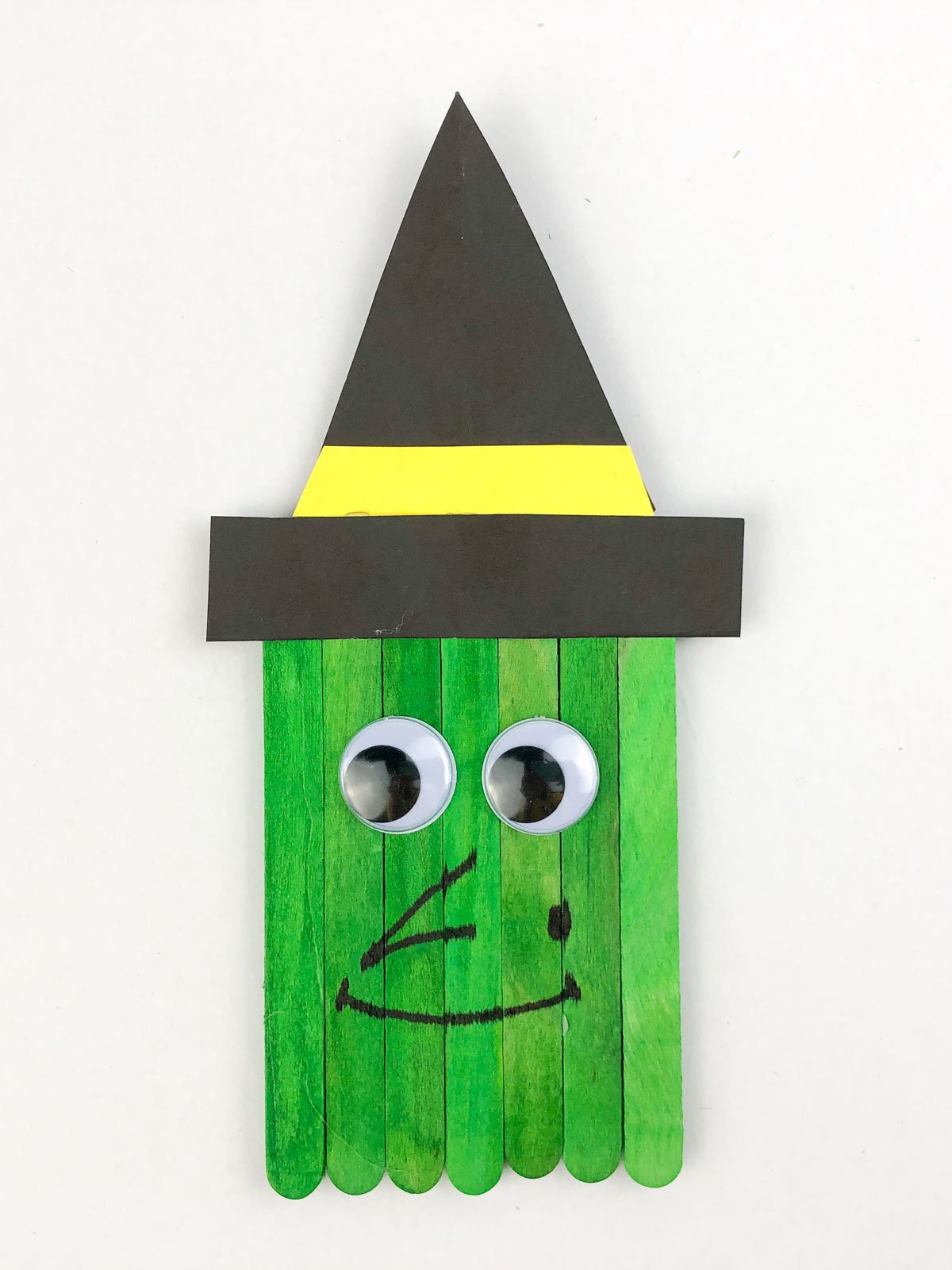 Halloween witch craft made with popsicle sticks