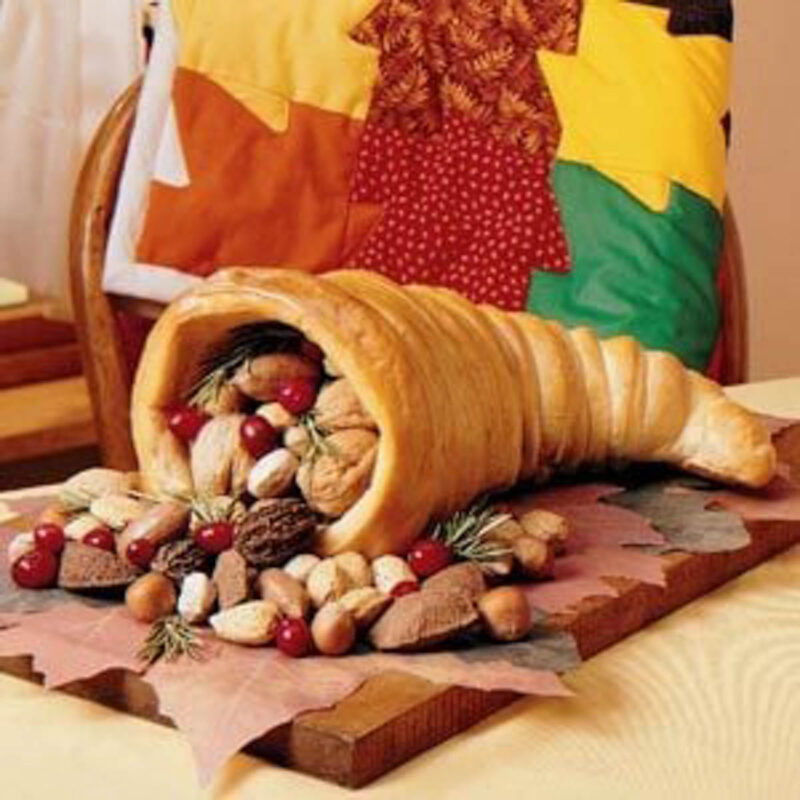 bread cornucopia filled with fruits and nuts