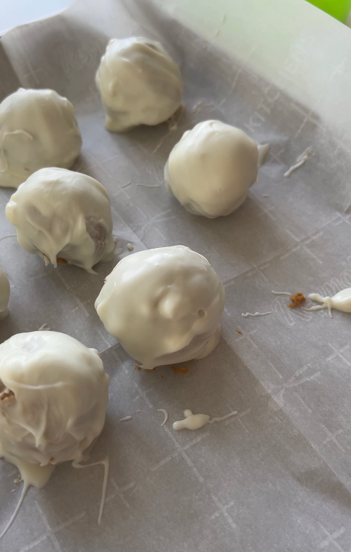 pumpkin balls setting on a baking sheet