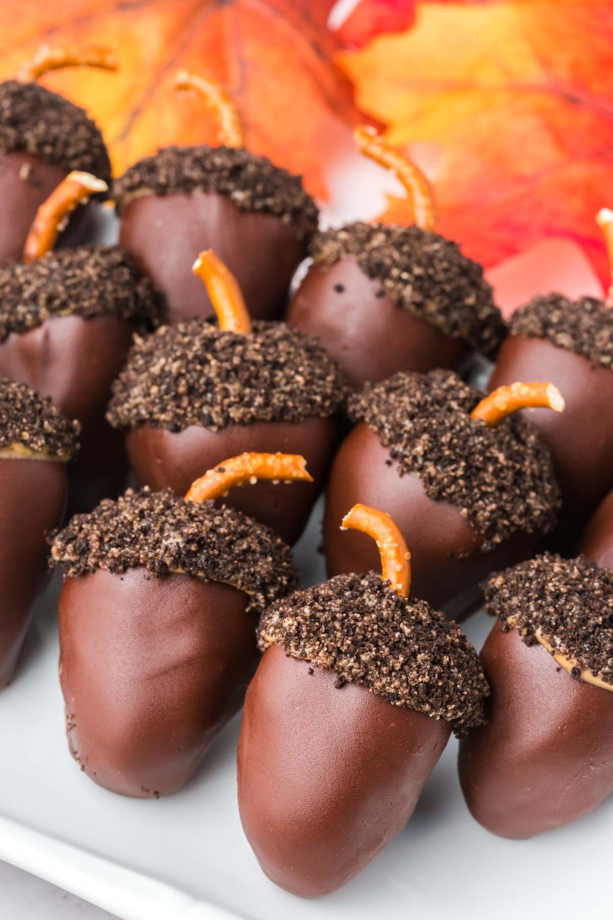 a plate full of acorn oreo balls