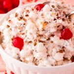 White bowl full of ambrosia salad