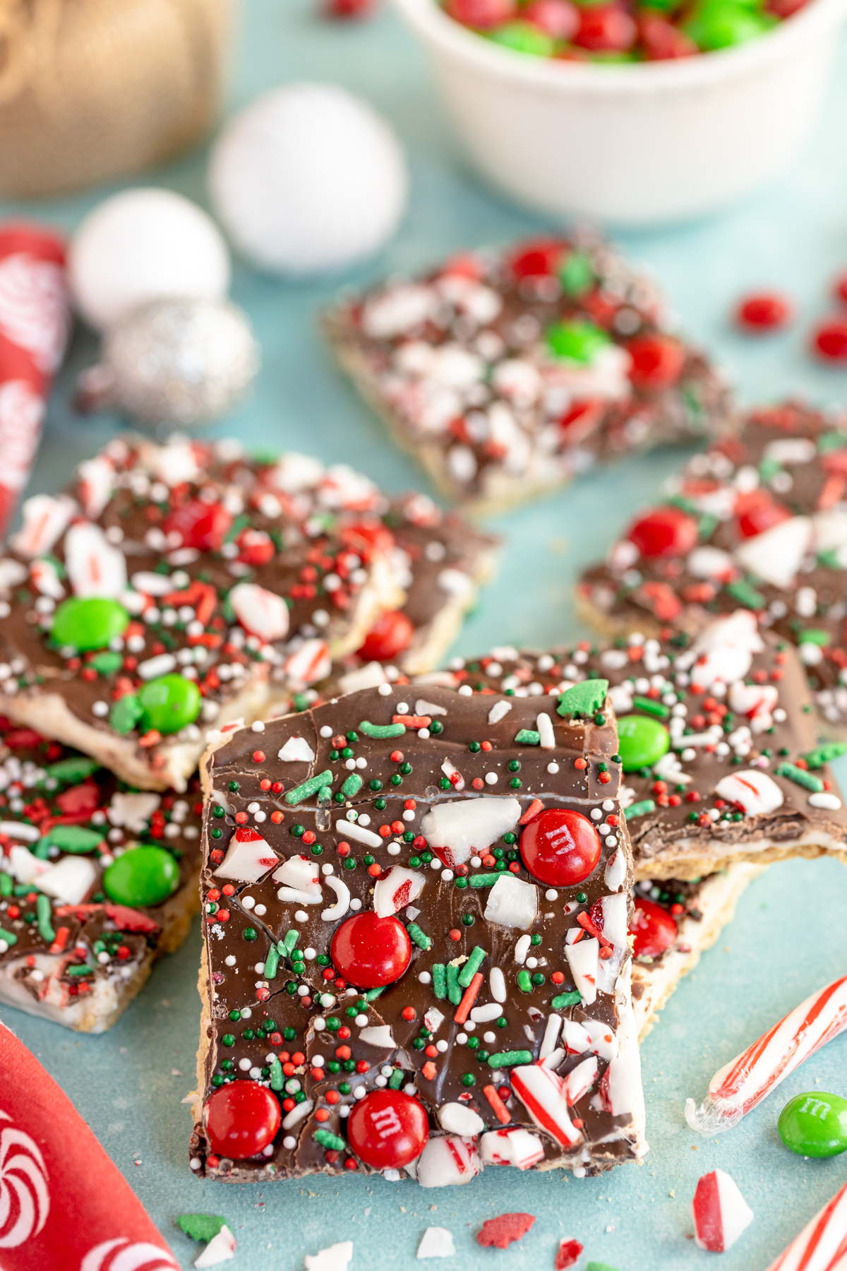 cut pieces of chocolate bark with sprinkles