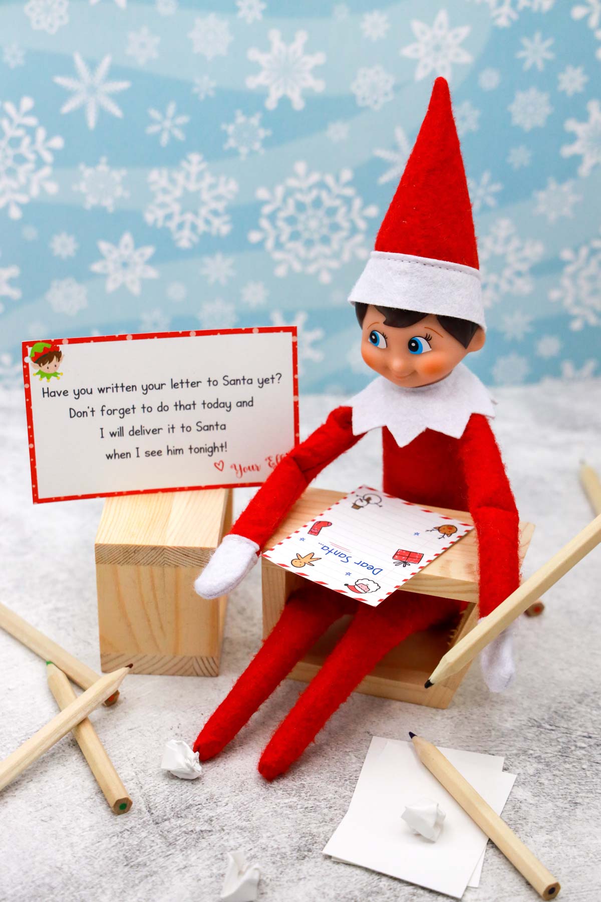 elf on the shelf writing a letter to santa
