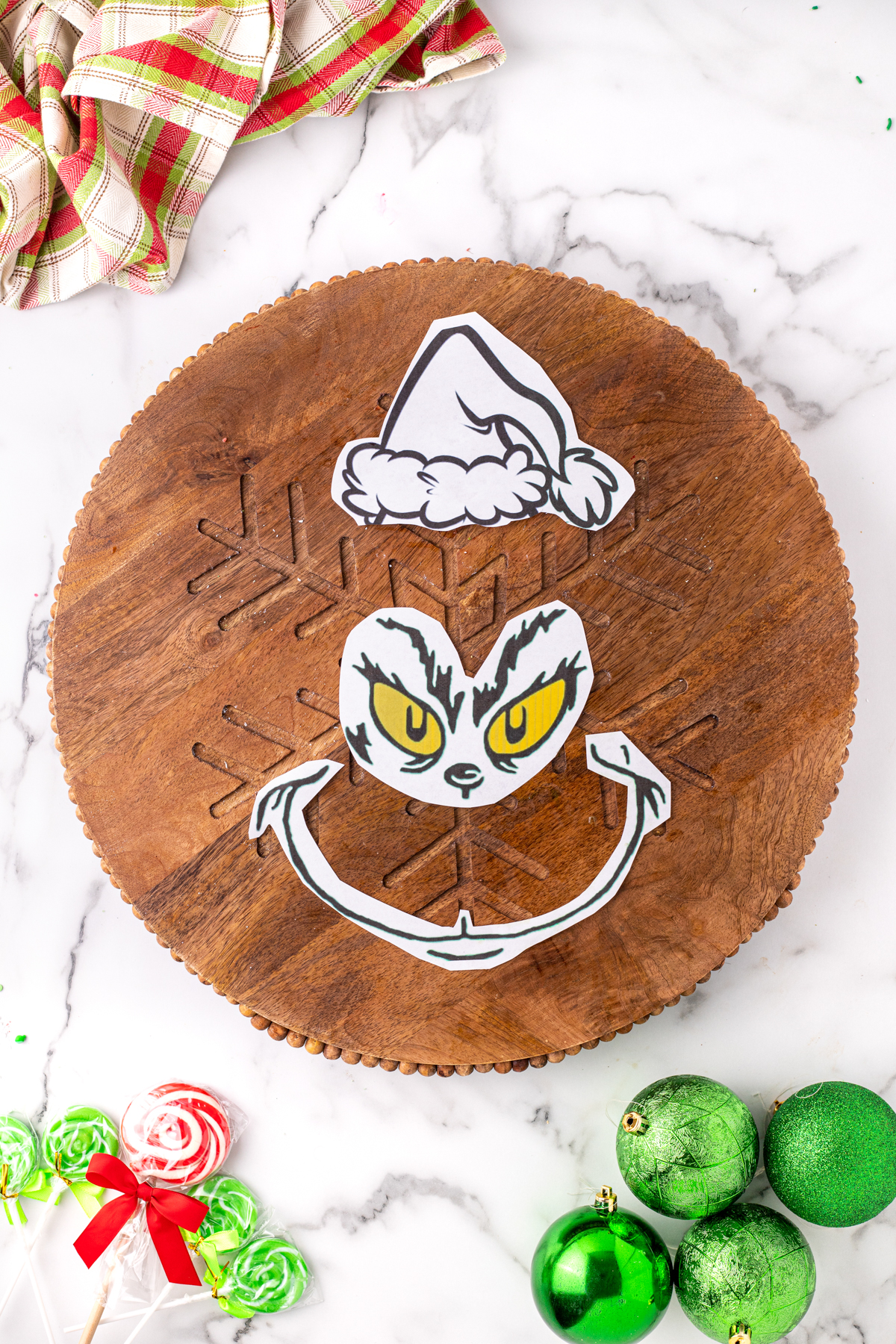 Grinch face template on a charcuterie board