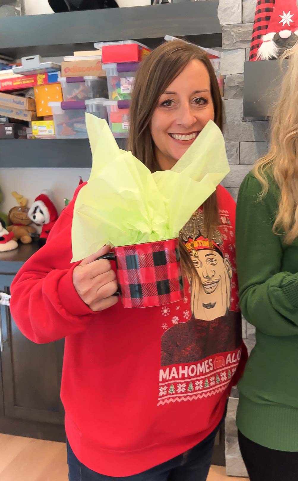 woman holding a wrapped mug