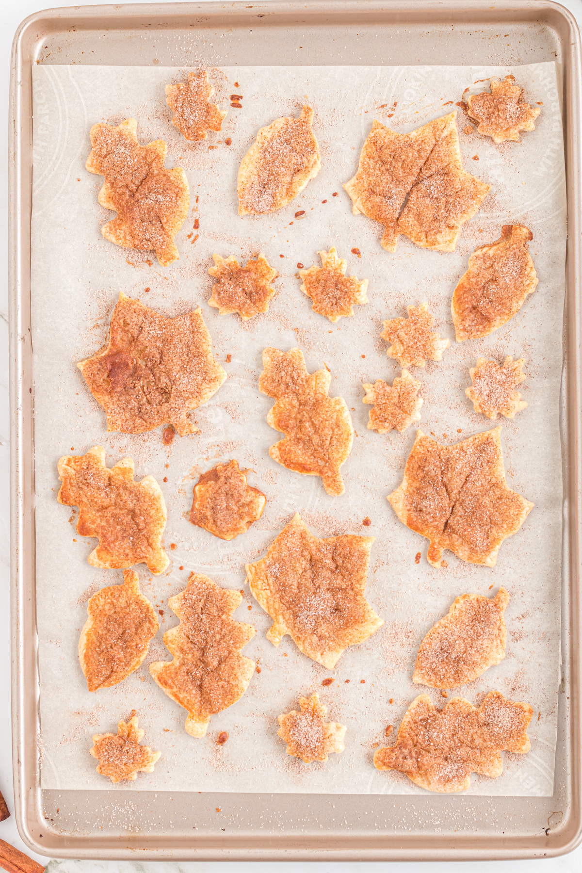 baking sheet with cooked pie crust cookies