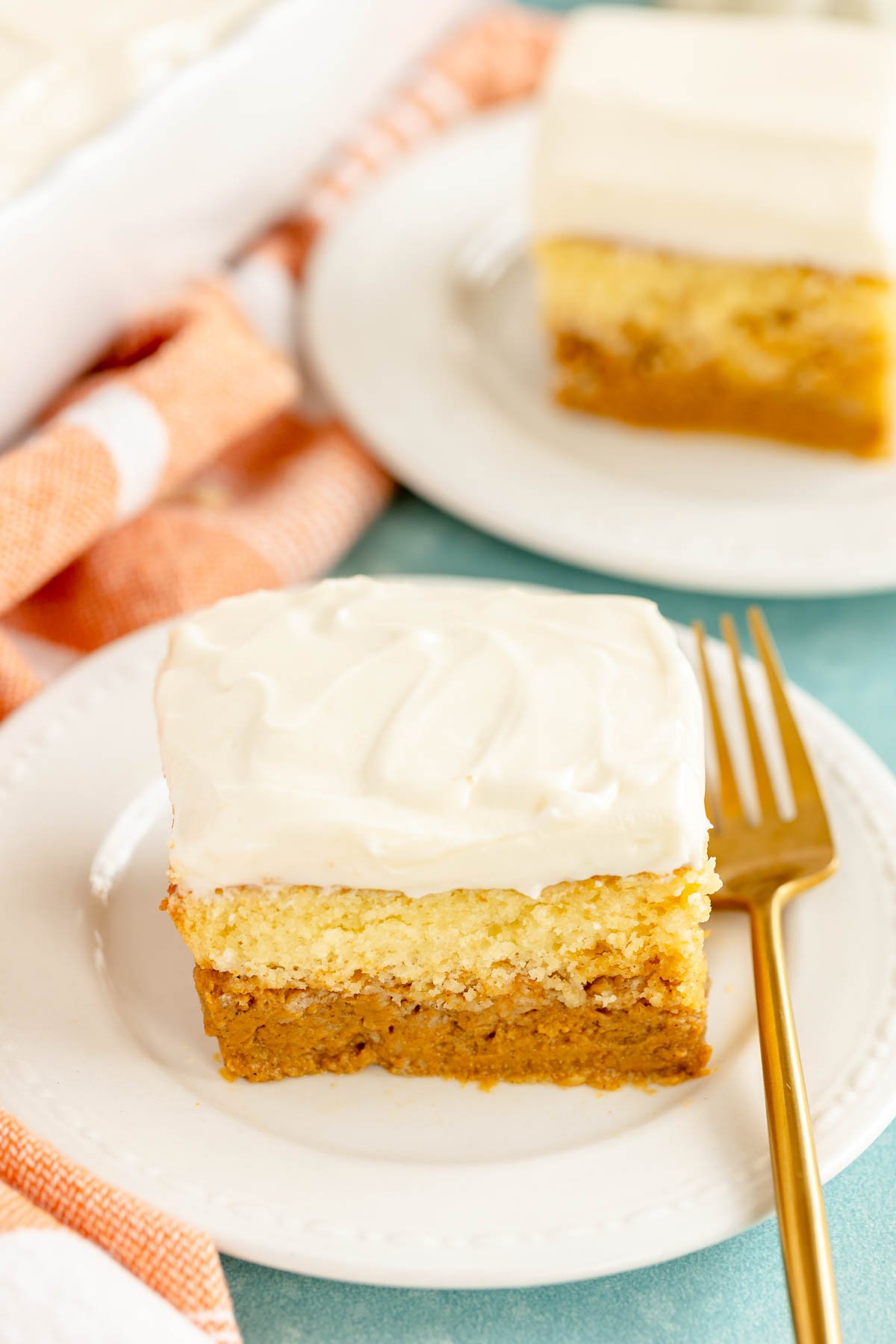 slice of pumpkin magic cake on a white plate