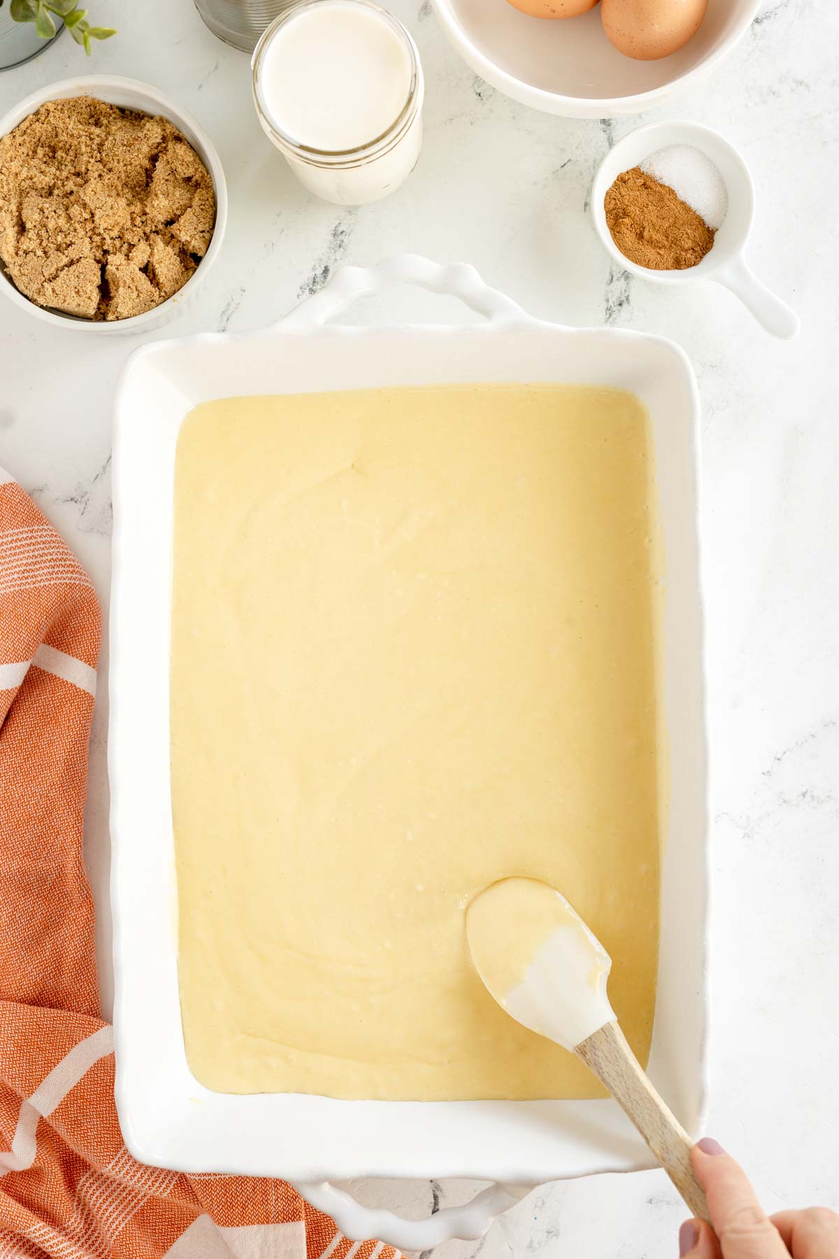 yellow cake mix batter in a pan
