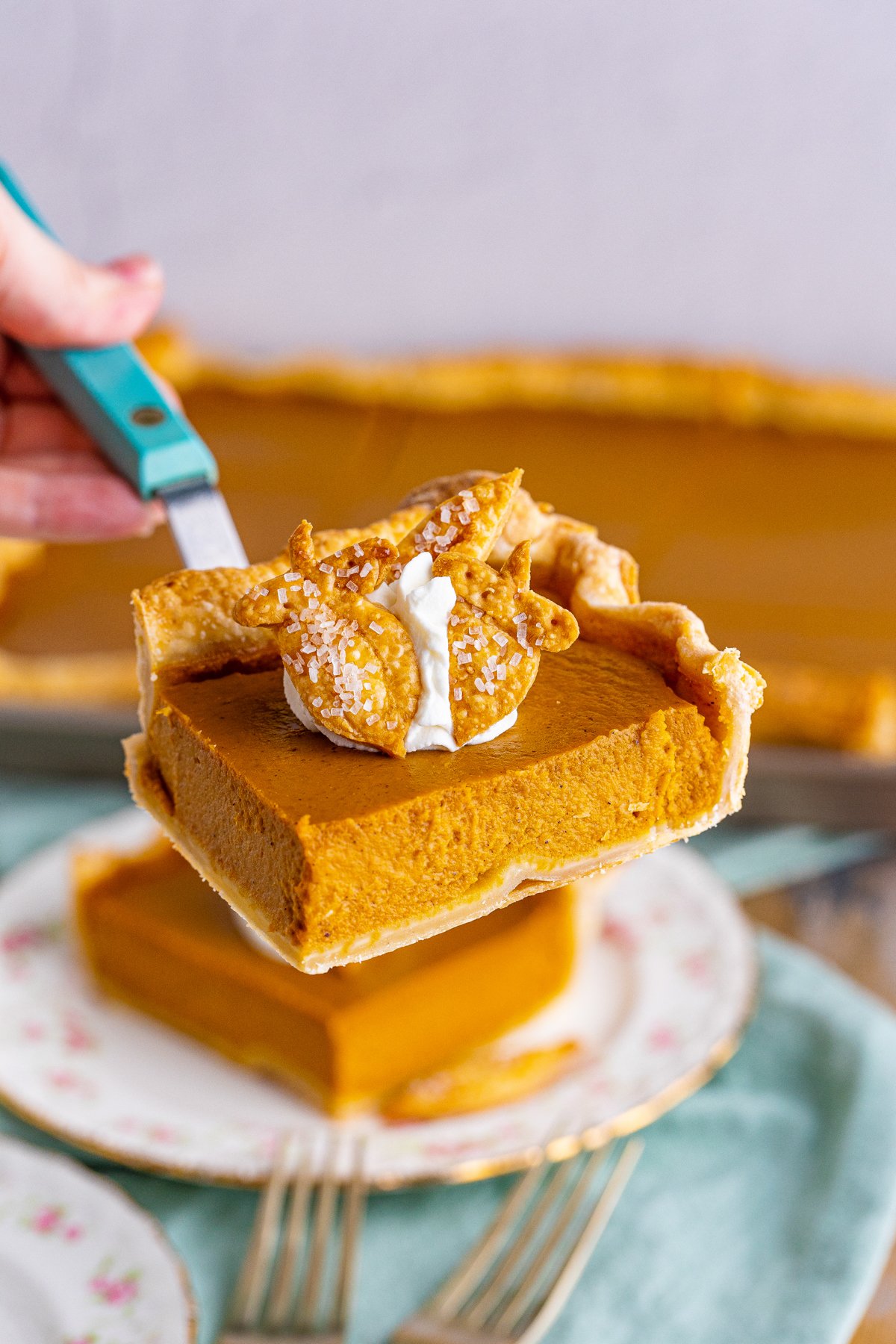 piece of pumpkin slab pie on a spatula