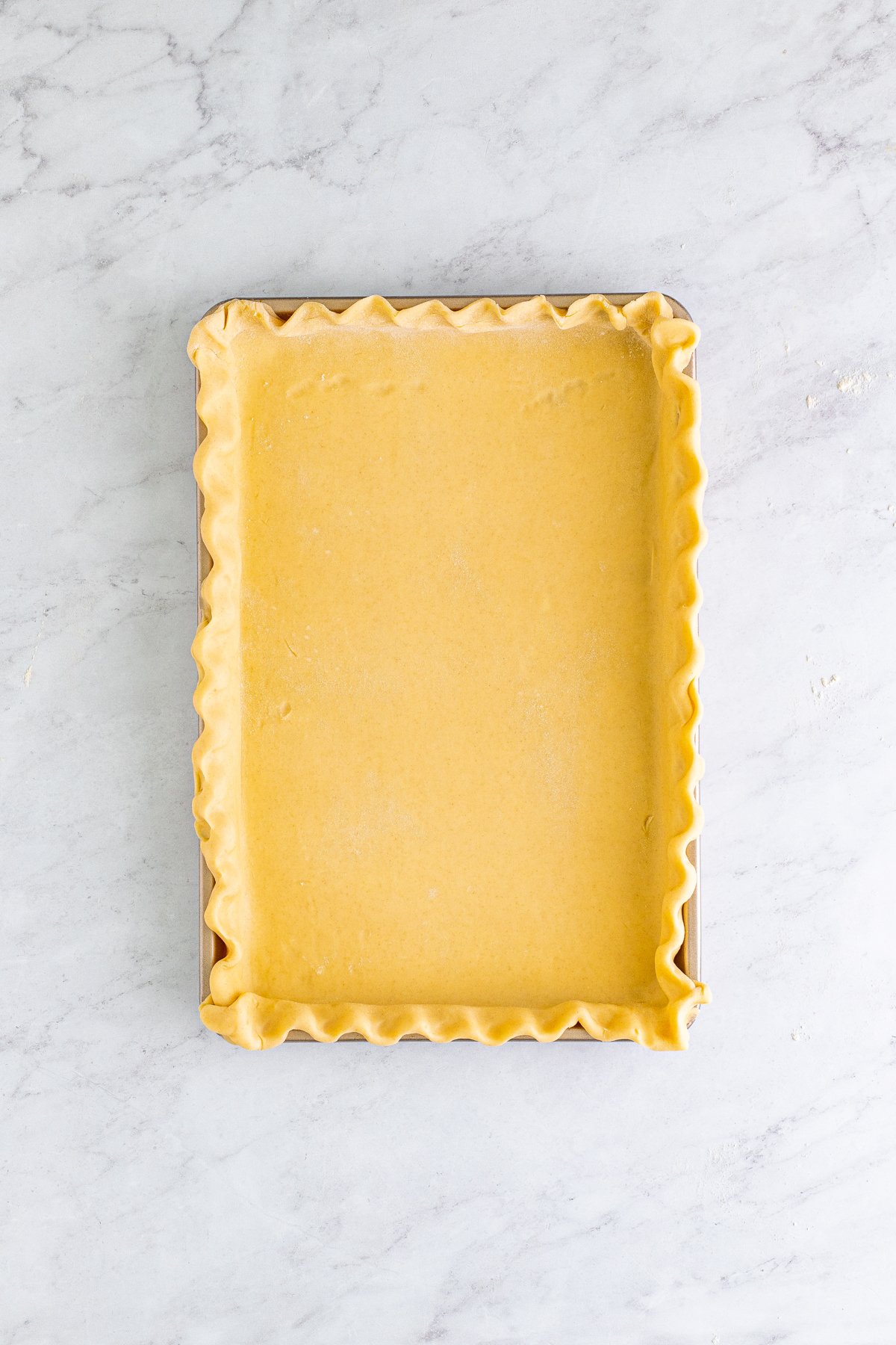 pie crust inside a jelly roll pan