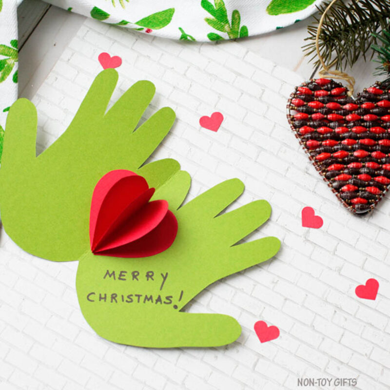 green handprint card with pop-up heart