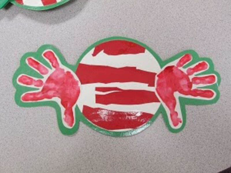 candy art project with handprint wrapper