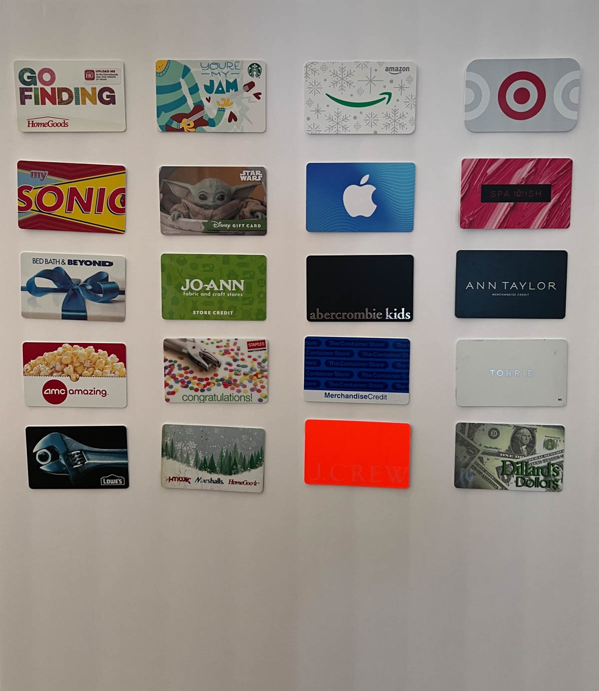 poster board with all sorts of gift cards for let's make a deal