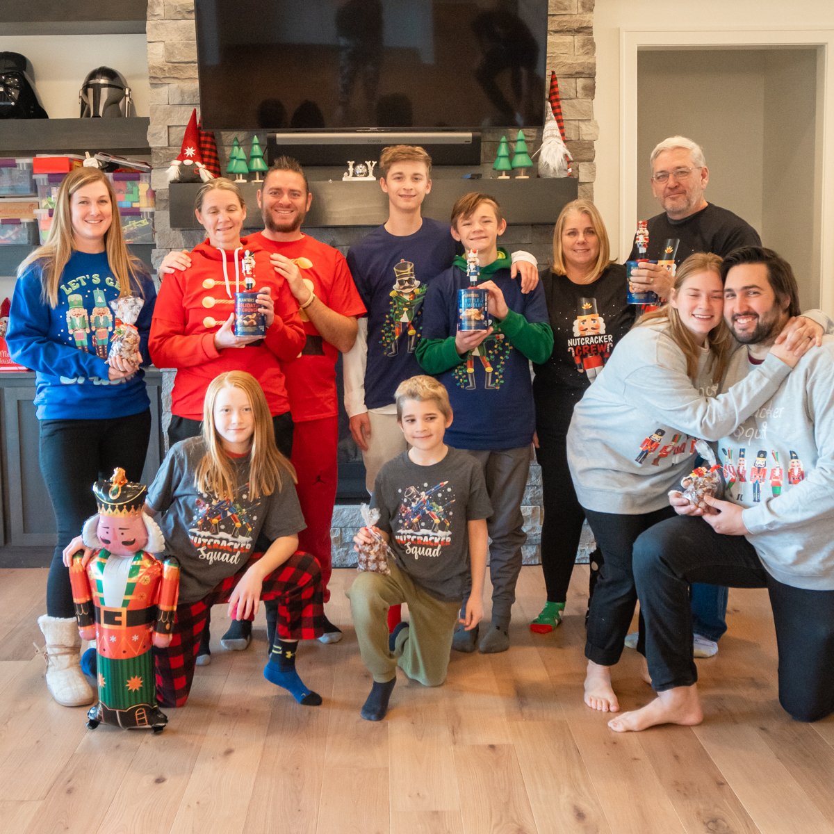 group of people wearing nutcracker shirts