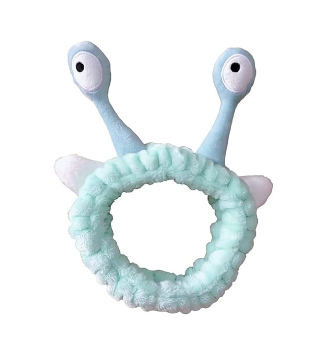 light blue headband with large snail eyes