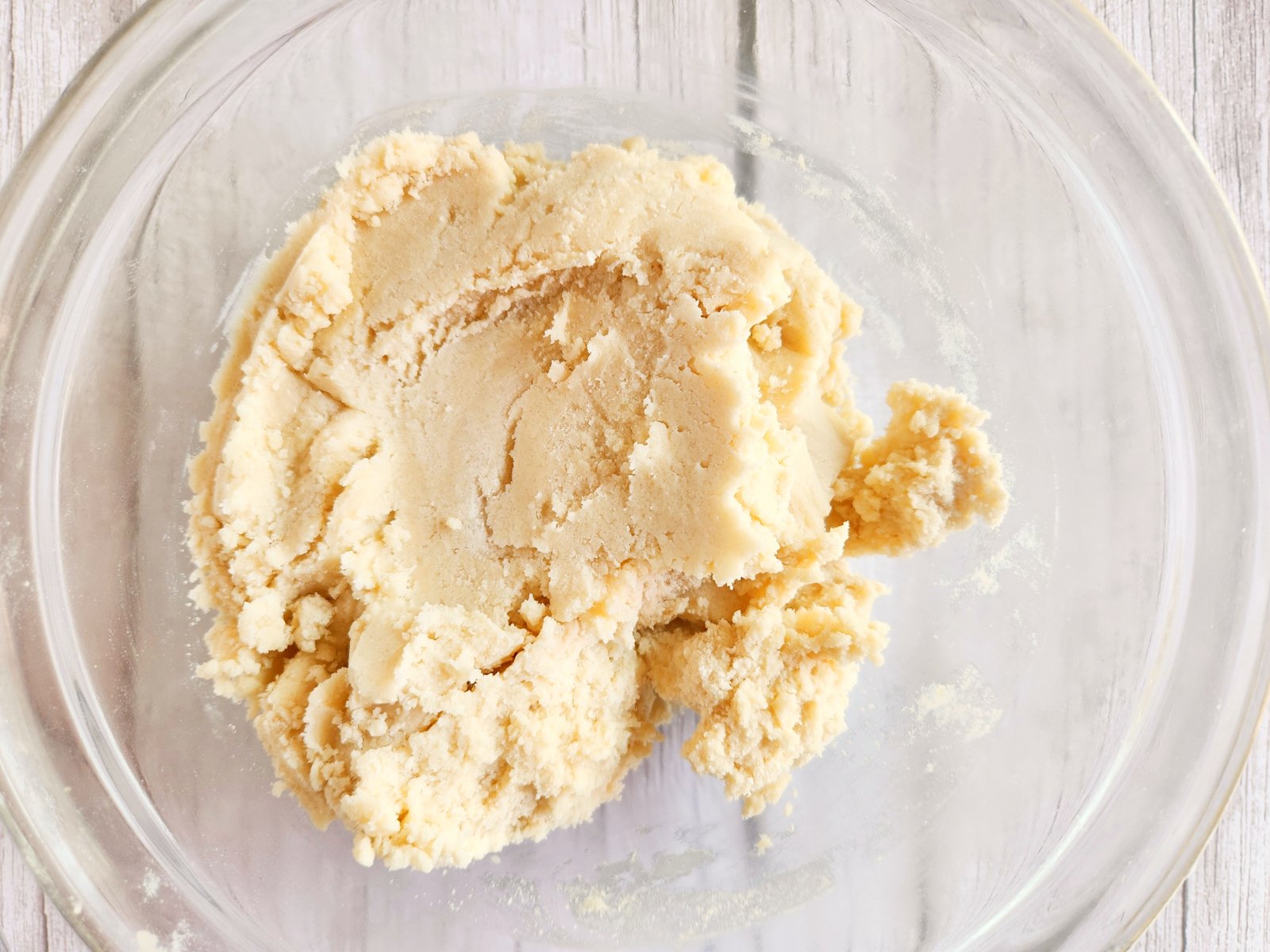 sugar cookie dough in a glass bowl