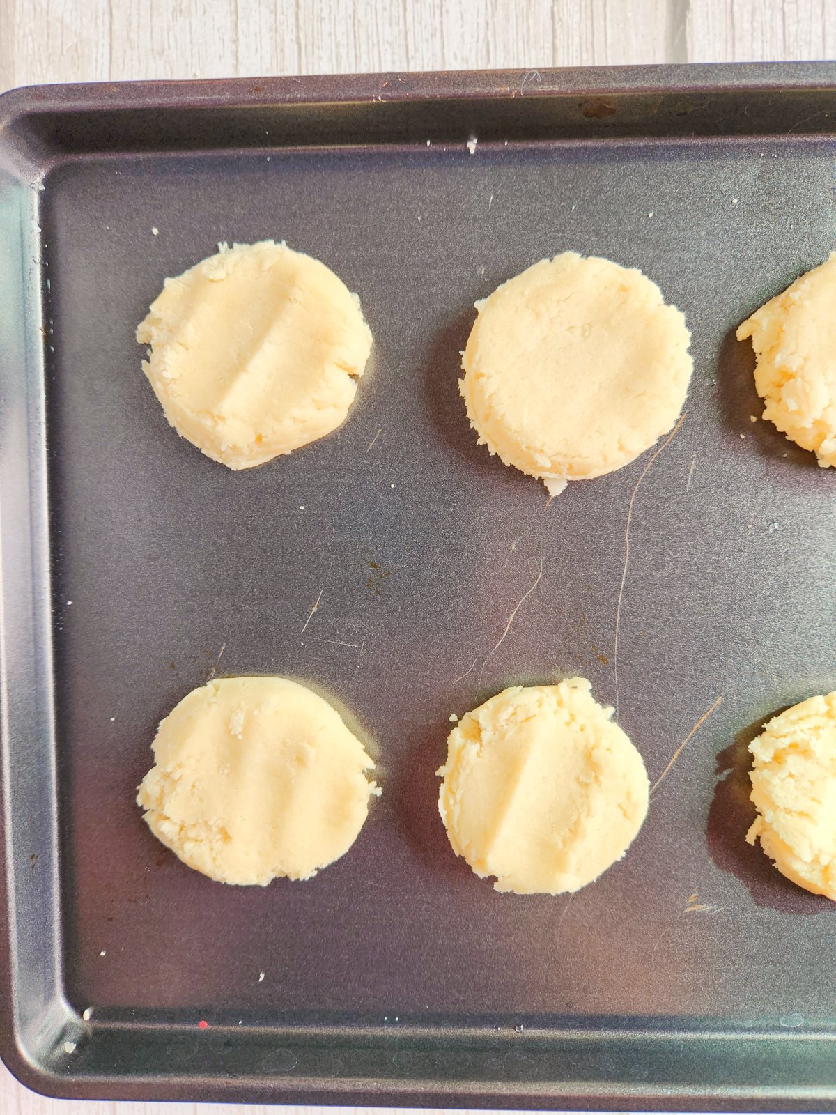 sugar cookie dough on a cookie sheet