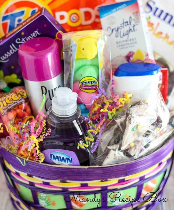 basket filled with treats and household items like soap and shaving cream