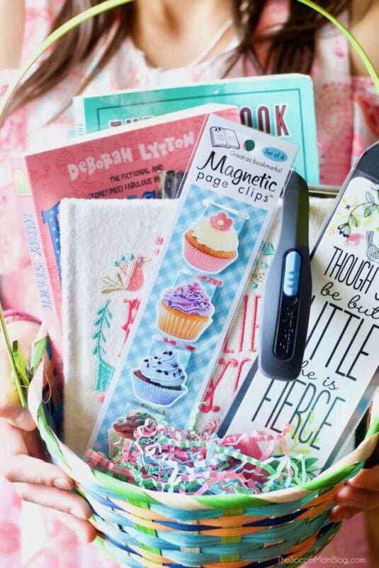 basket with books and reading accessories