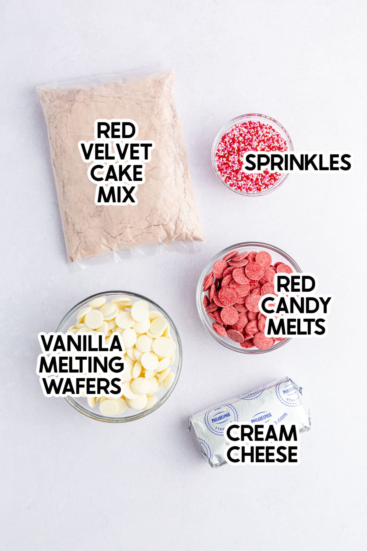 ingredients in no bake red velvet cake balls with labels