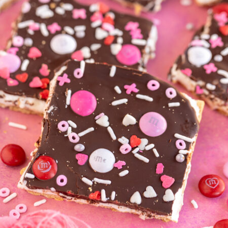 square of graham cracker bark with Valentine's Day sprinkles
