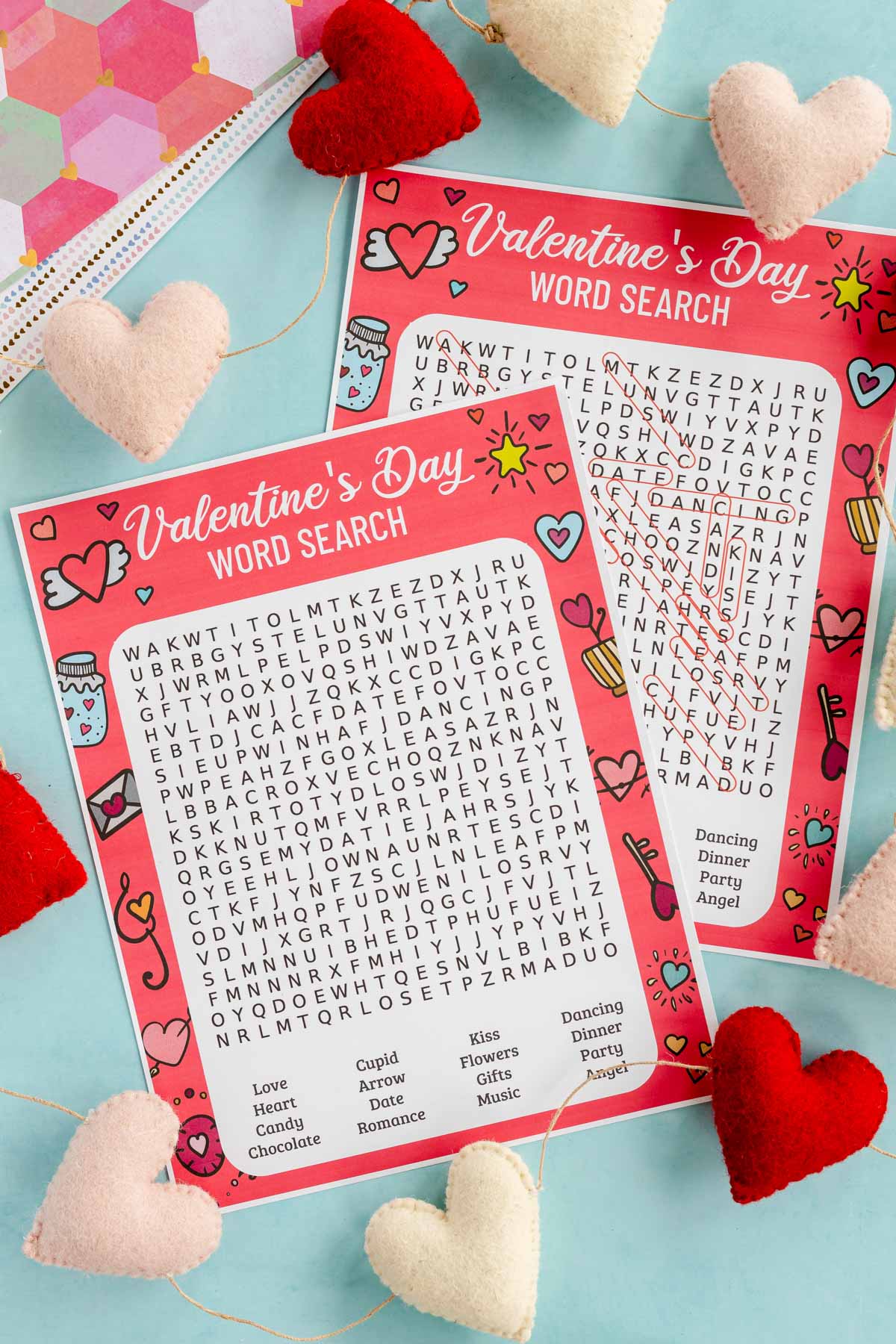 Valentine's Day word search printable and answer sheet on top of each other