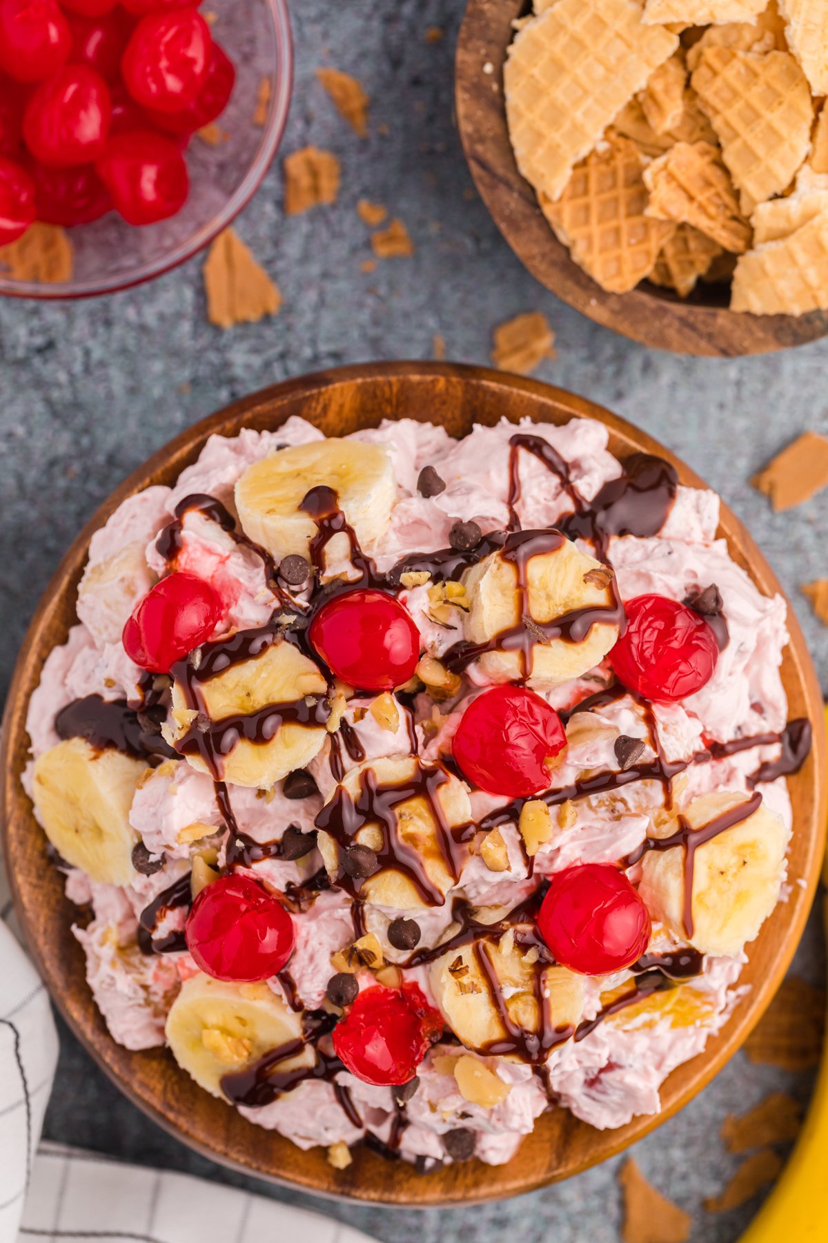 banana split fluff with chocolate syrup on top