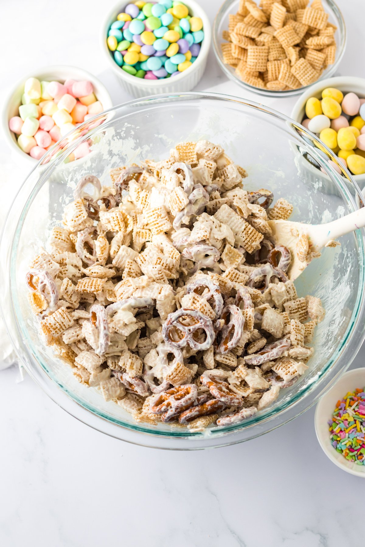 pretzels and chex cereal in melted chocolate