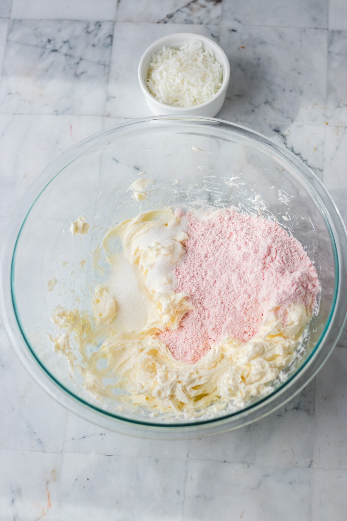 glass bowl with cream cheese and cake mix