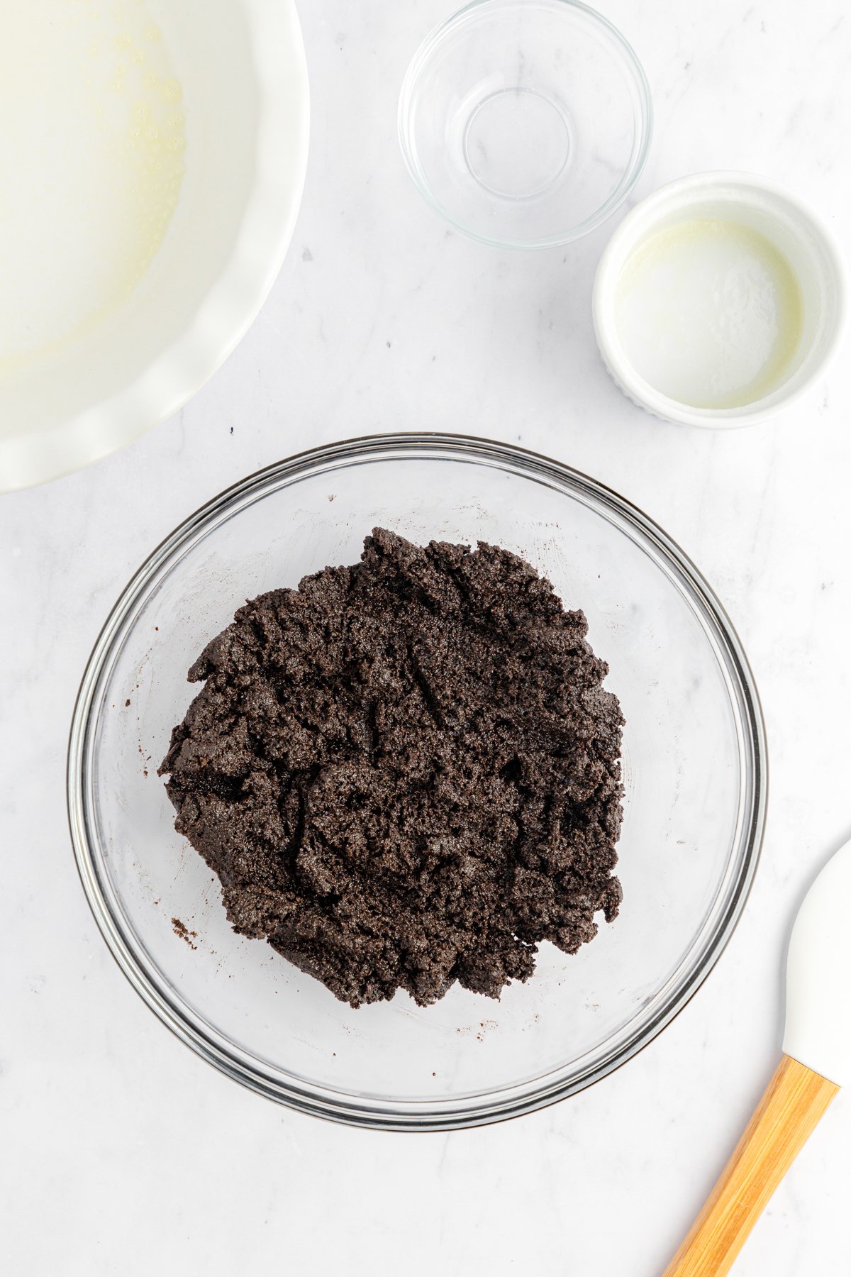 glass bowl with Oreos crumbs in it