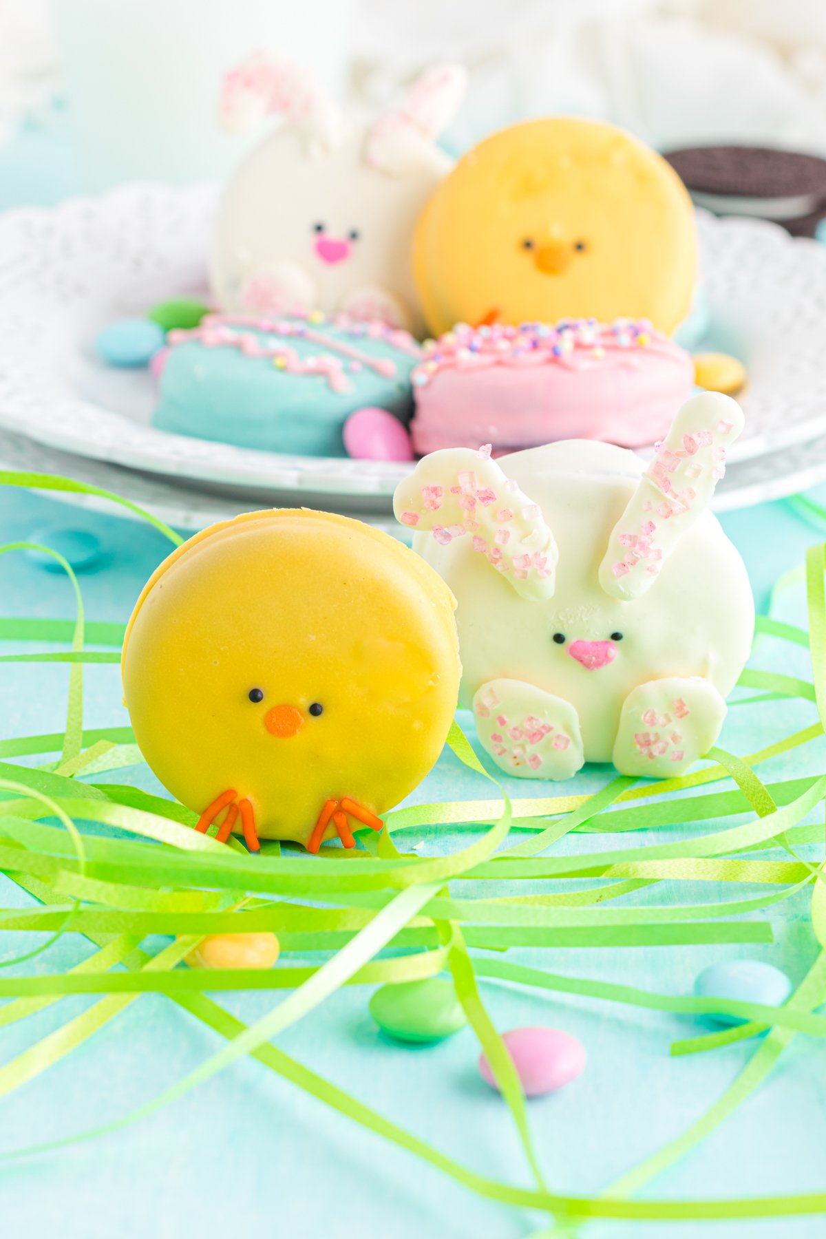 Easter Oreos standing up on Easter grass