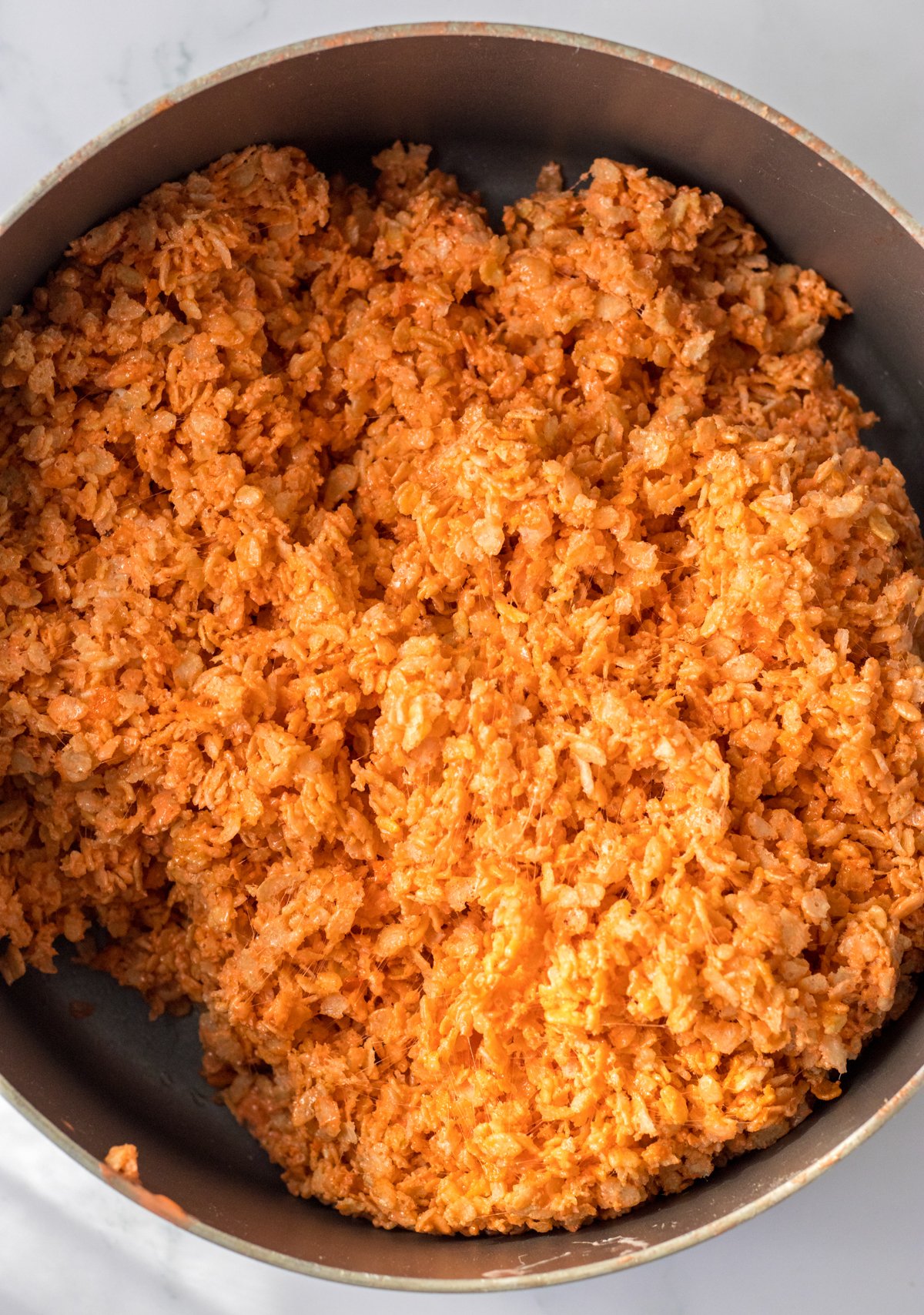 pot with orange rice krispies