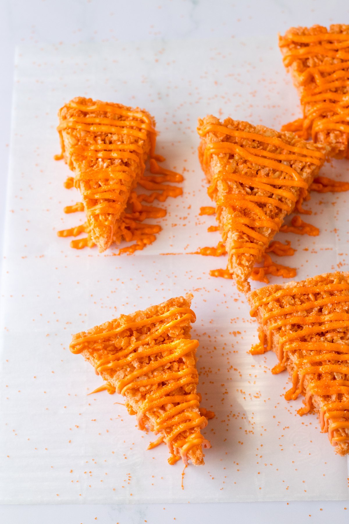 orange rice krispy treats with orange candy melts