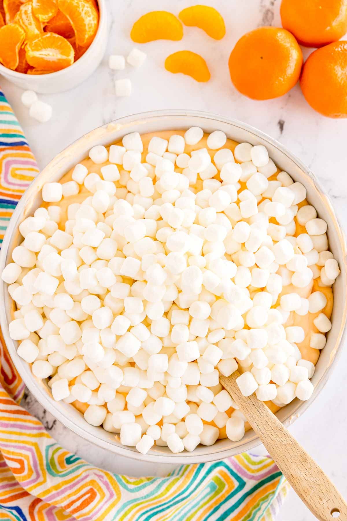 mini marshmallows in a big bowl of orange fluff