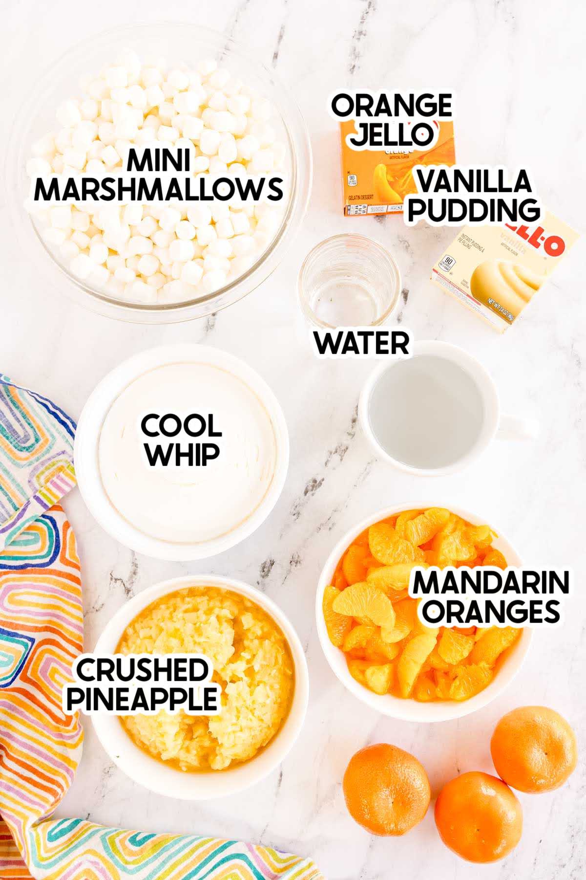 ingredients in orange fluff with labels