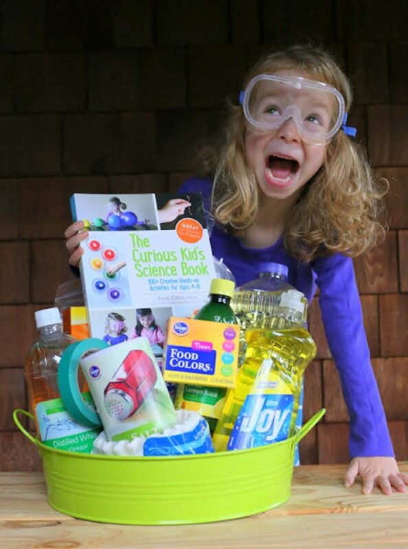 metal bin with science experiment kit and supplies